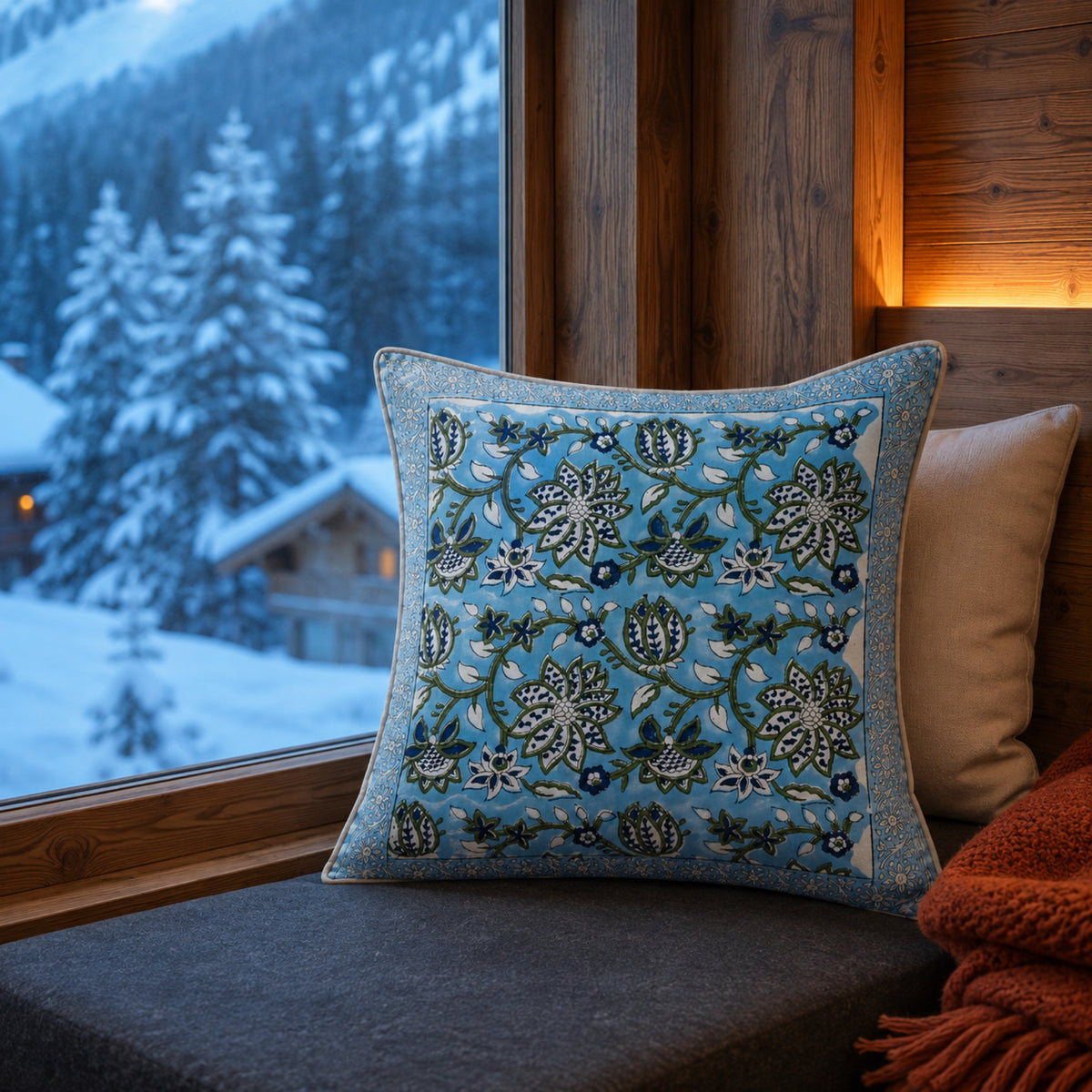 Sky Blue Lotus Vine Cushion Cover, styled in a seating or bedroom setting.