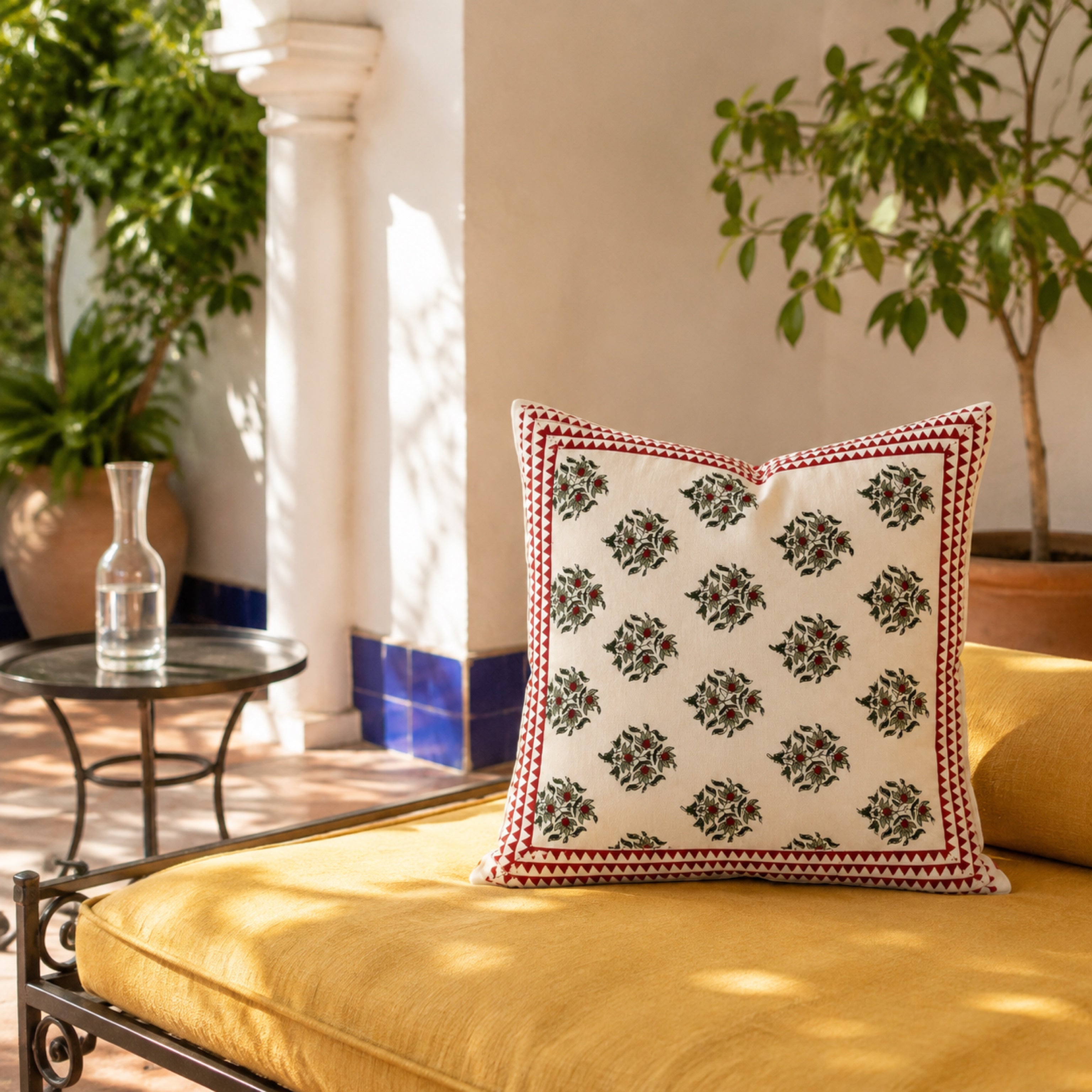 Red Berry Sprig Cushion Cover, styled in a seating or bedroom setting.