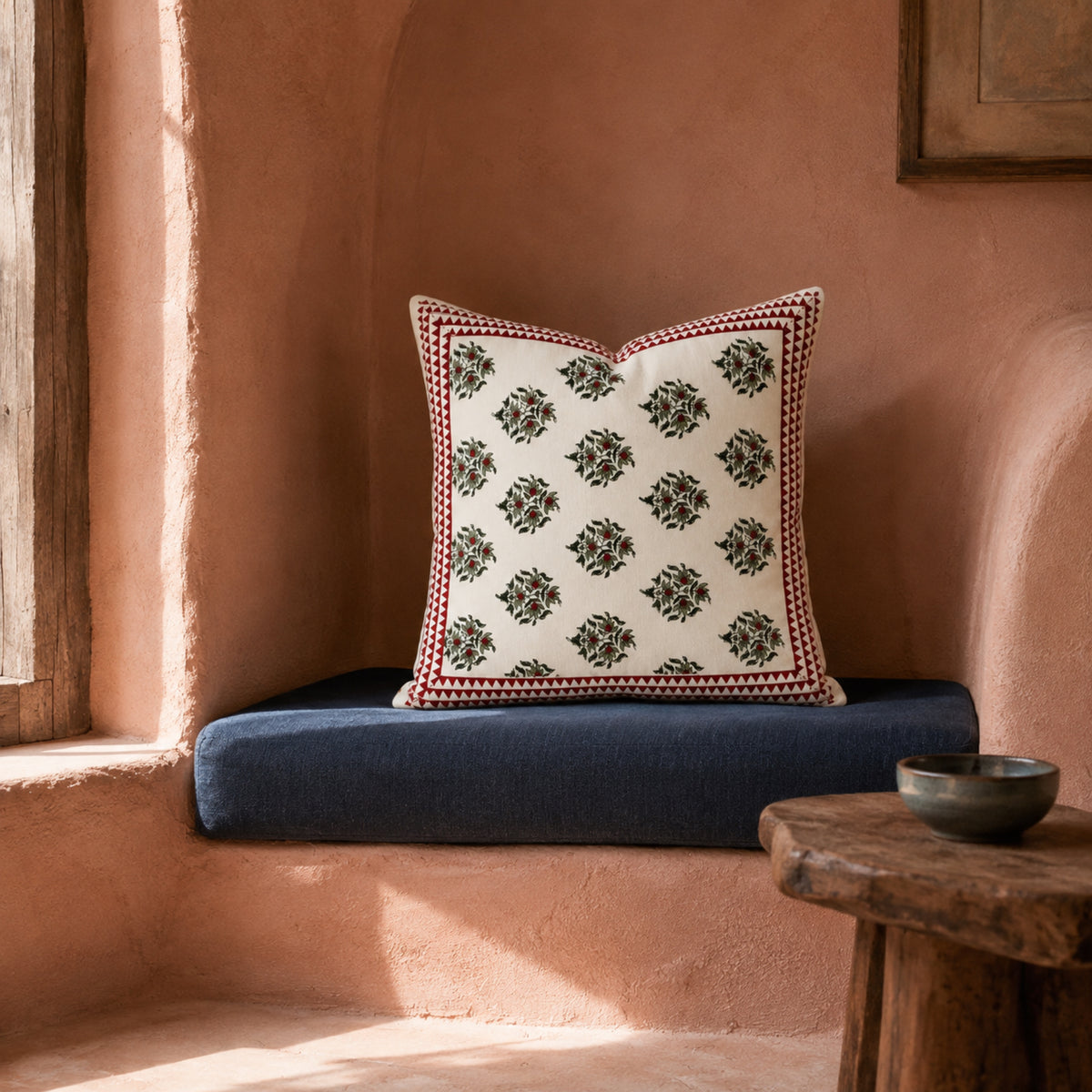 Red Berry Sprig Cushion Cover, styled in a seating or bedroom setting.