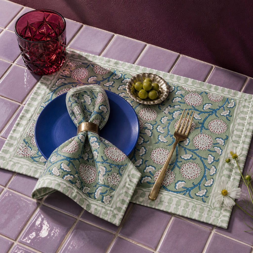 Sage Pom-Pom Floral Mat & Napkin Set, close-up of the print and edge details.