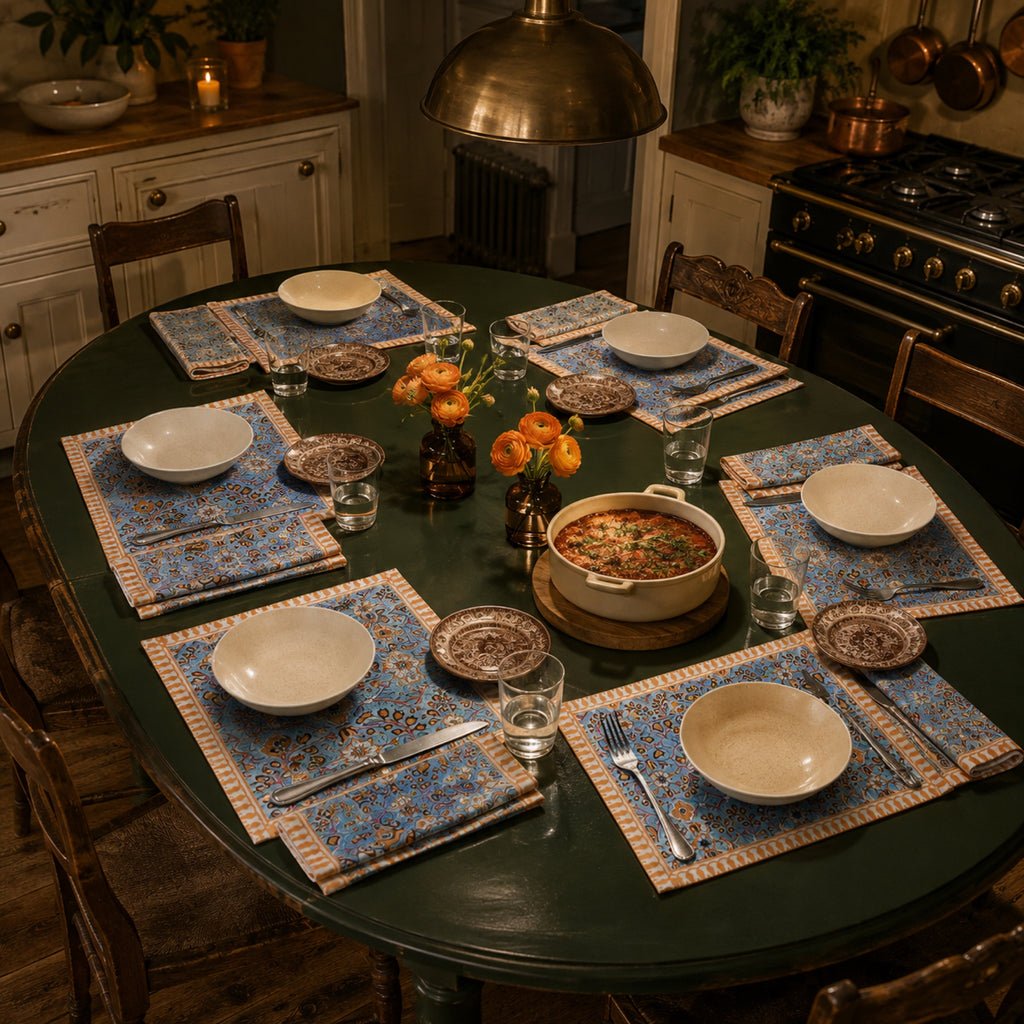Turquoise Orange Floral Mat & Napkin Set, styled on a dining table.