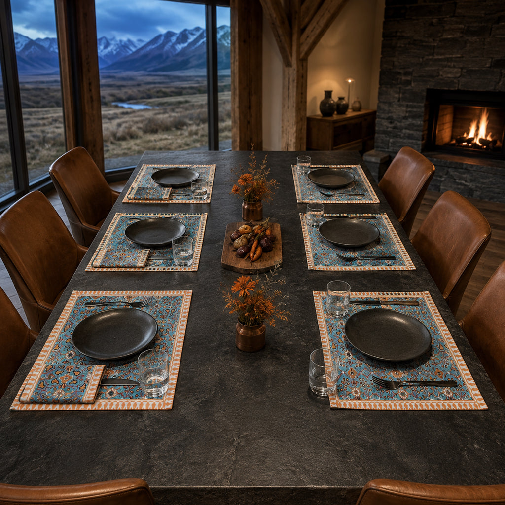 Turquoise Orange Floral Mat & Napkin Set, styled on a dining table.