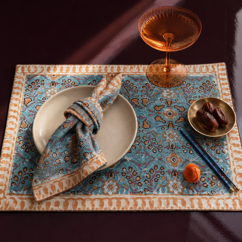 Turquoise Orange Floral Mat & Napkin Set, close-up of the print and edge details.