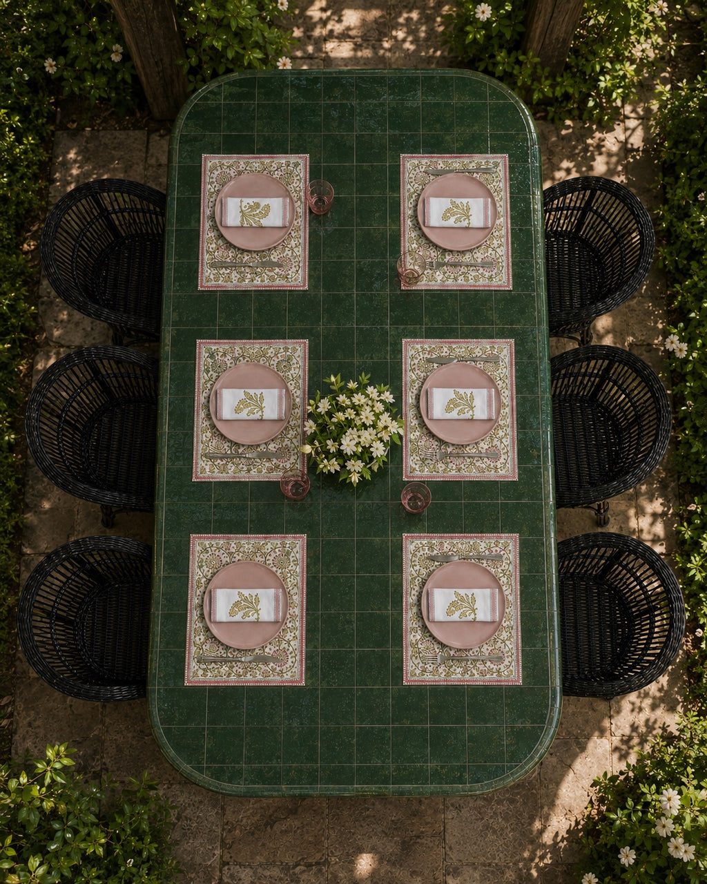 Olive Pink Floral Mat & Napkin Set, styled on a dining table.