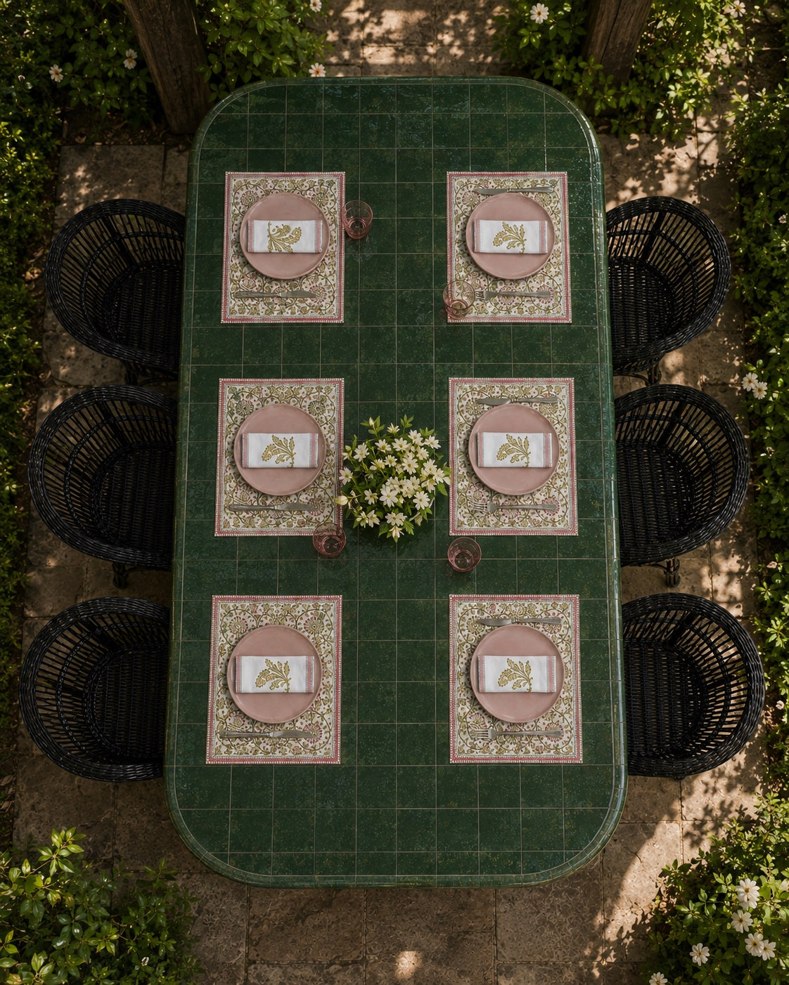 Olive Pink Floral Mat & Napkin Set, styled on a dining table.