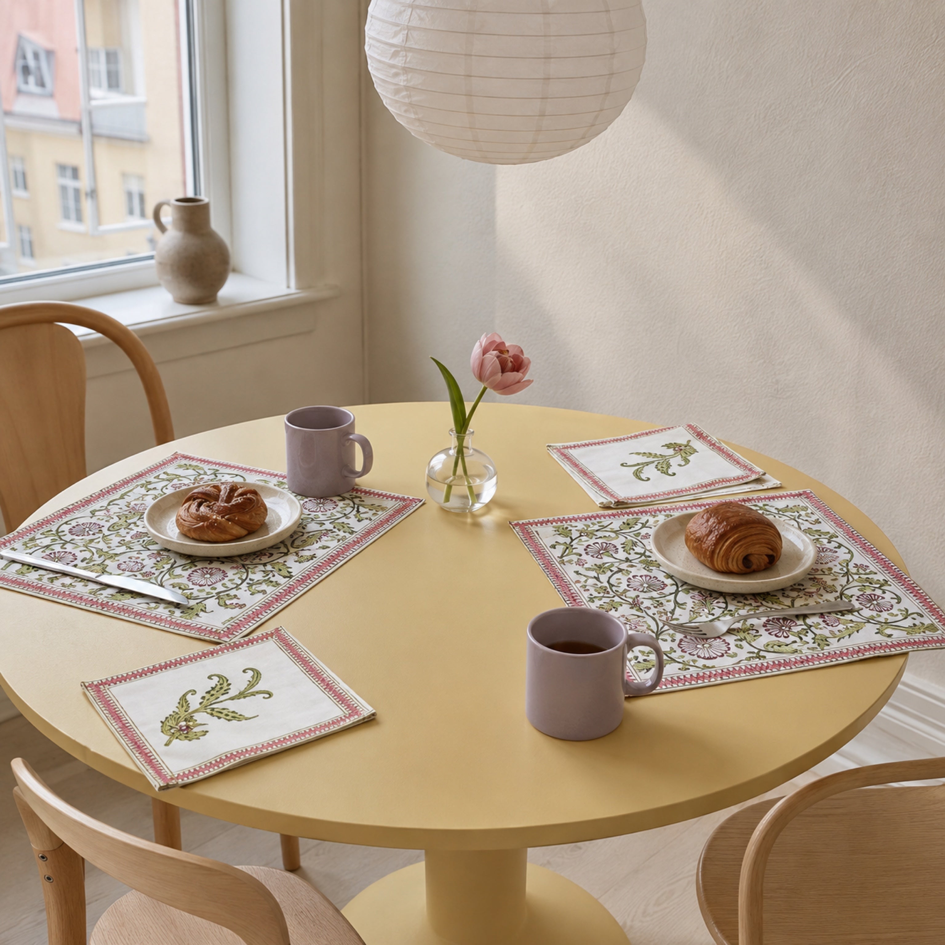 Olive Pink Floral Mat & Napkin Set, styled on a dining table.