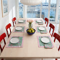 Mint Scroll Floral Mat & Napkin Set, styled on a dining table.