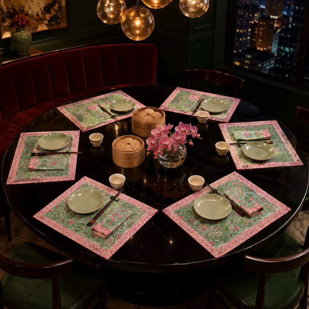 Mint Scroll Floral Mat & Napkin Set, styled on a dining table.