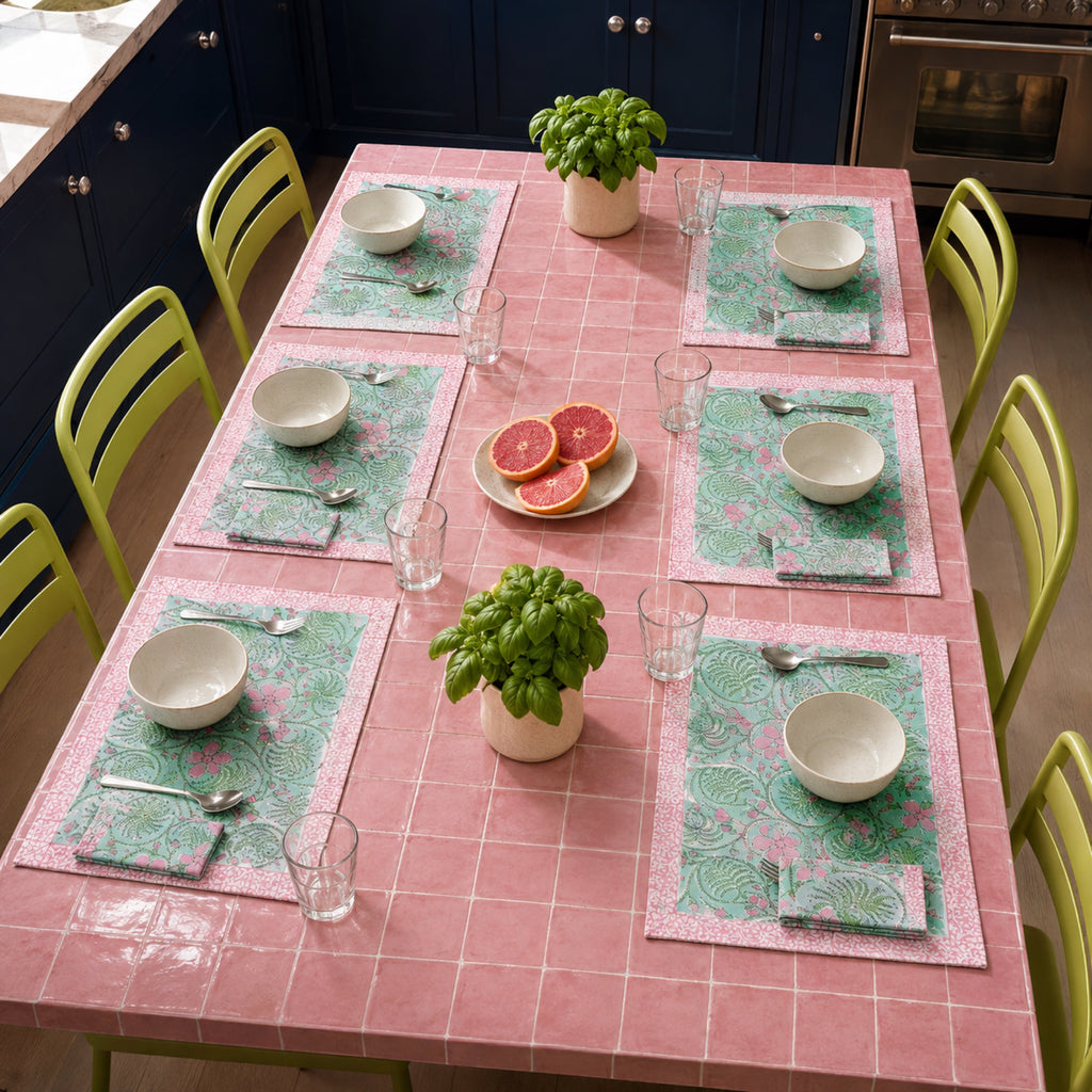Mint Scroll Floral Mat & Napkin Set, styled on a dining table.