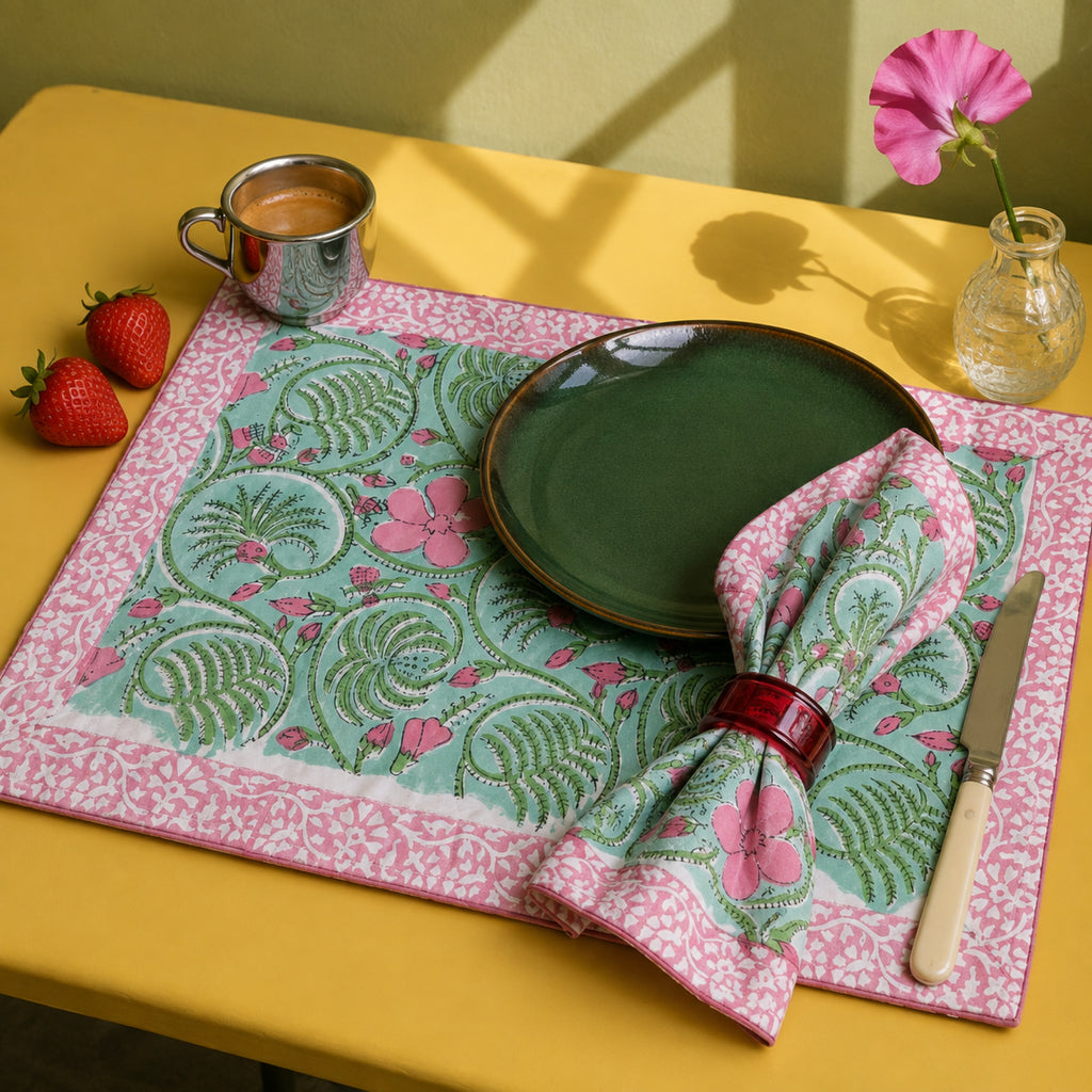 Mint Scroll Floral Mat & Napkin Set, styled on a dining table.