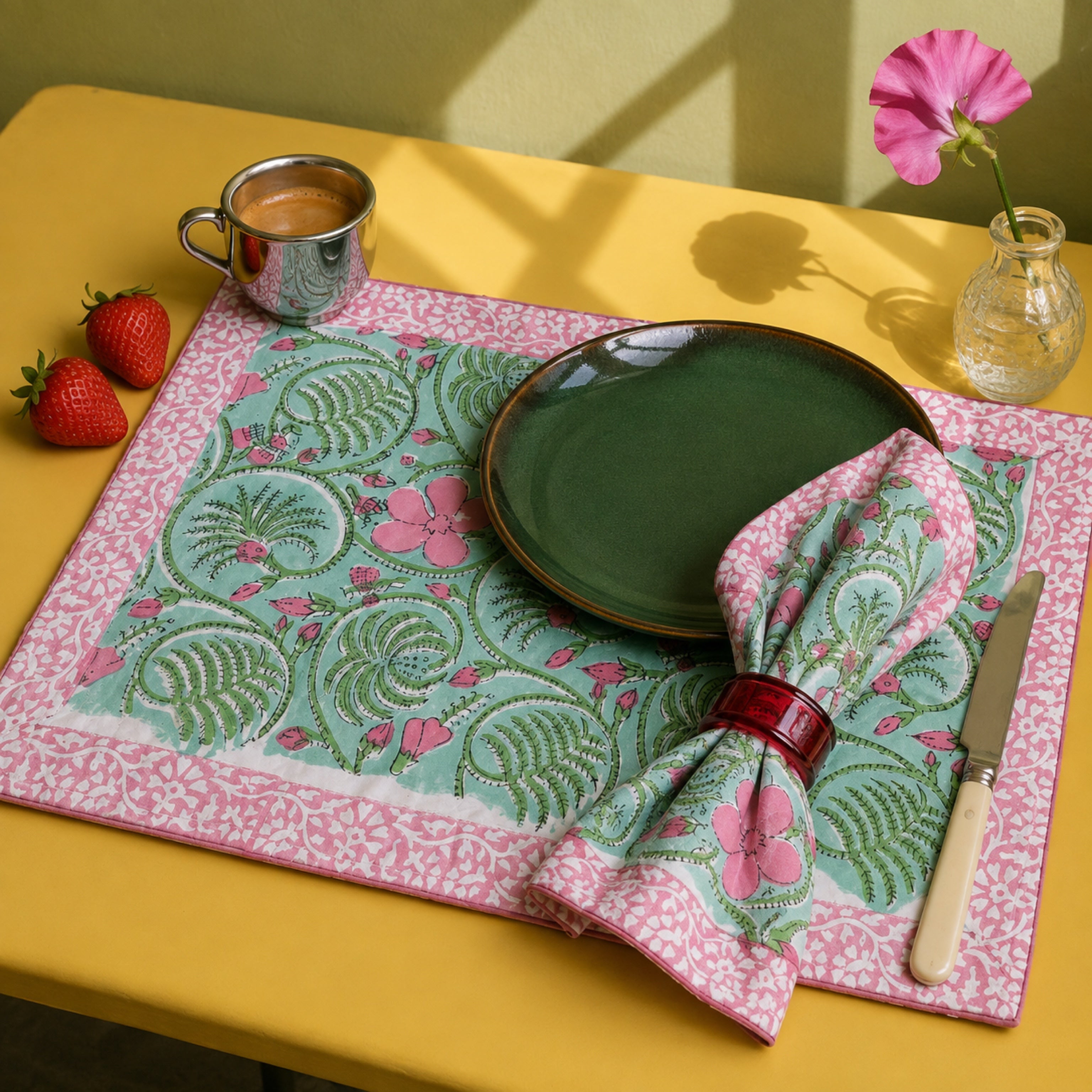Mint Scroll Floral Mat & Napkin Set, styled on a dining table.