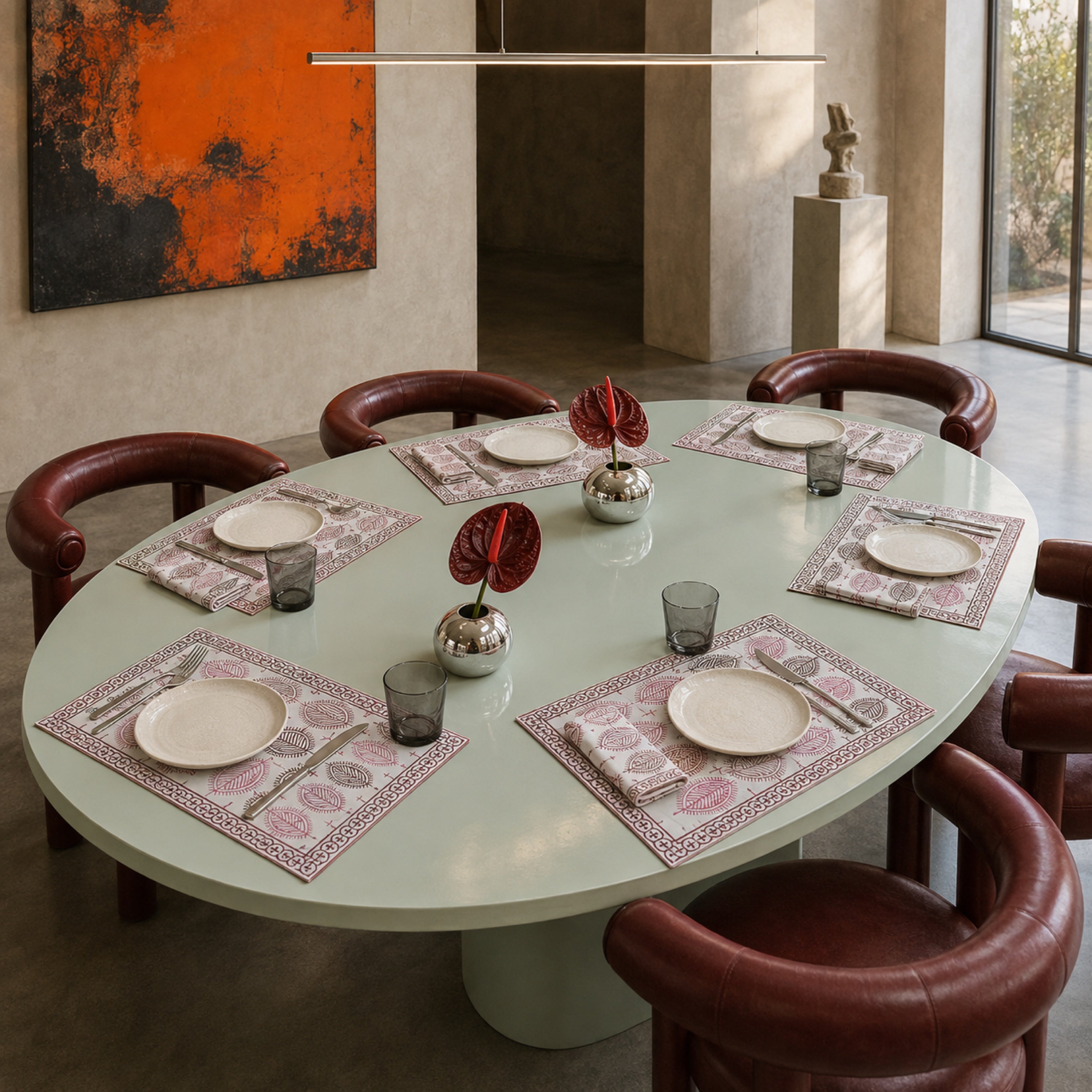 Dusty Pink Leaf Mat & Napkin Set, styled on a dining table.