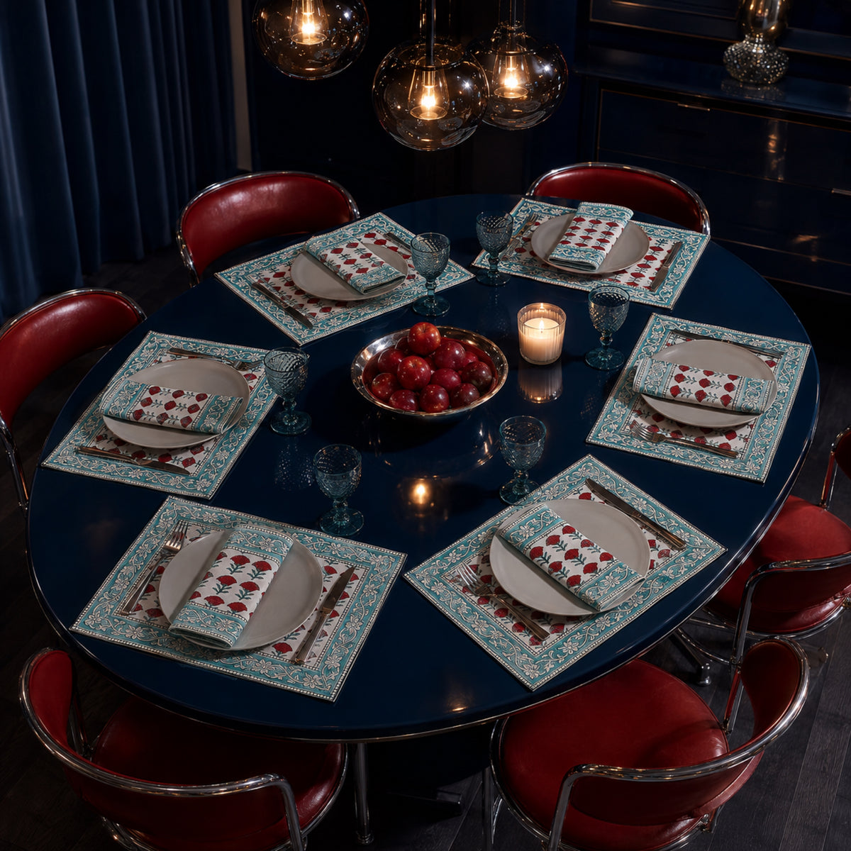 Red Marigold Aqua Border Mat & Napkin Set, styled on a dining table.