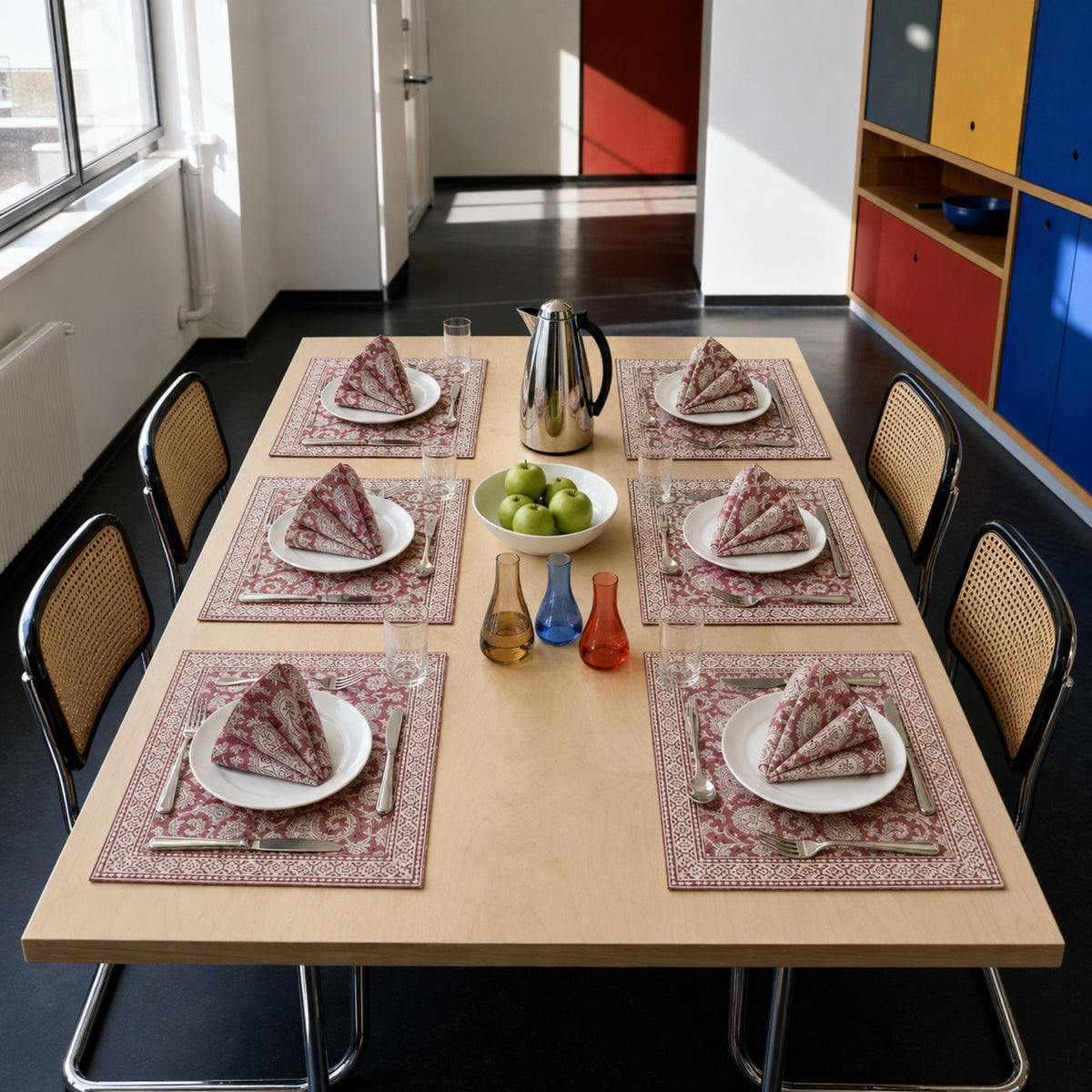 Dusty Rose Paisley Mat & Napkin Set, styled on a dining table.