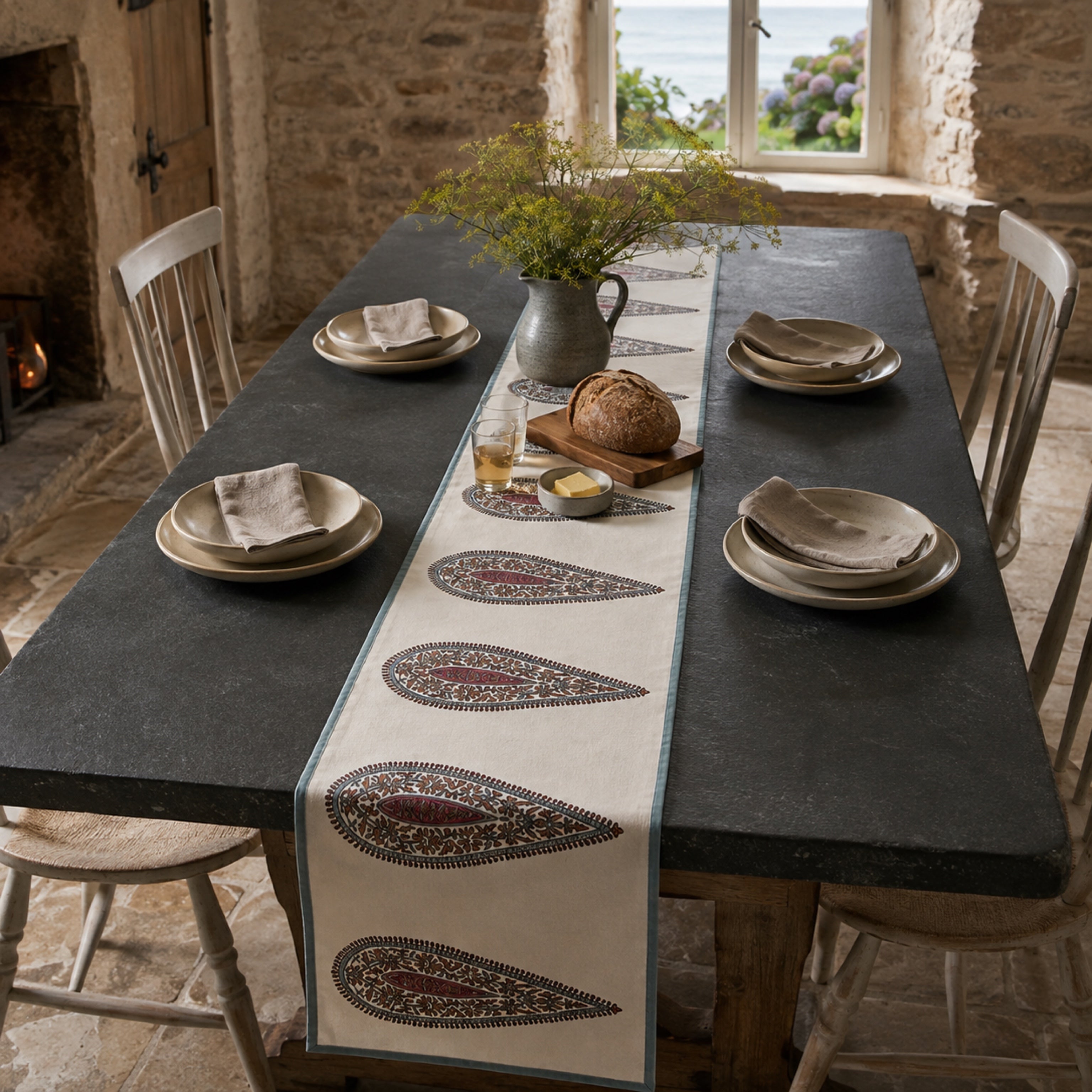 Multicolour Paisley Table Runner, styled on a dining table.