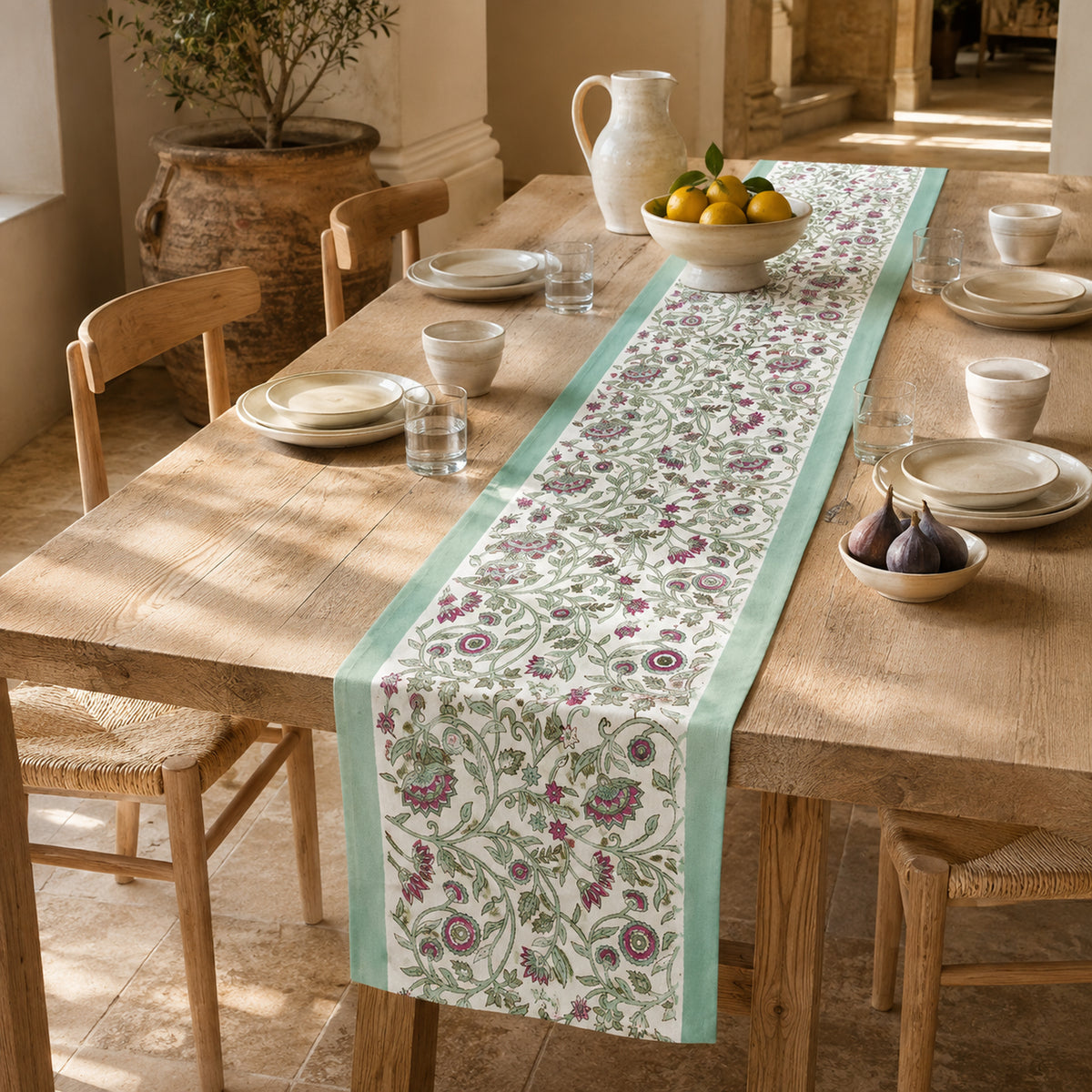 Mint Edge Multicolour Floral Vine Table Runner, styled on a dining table.