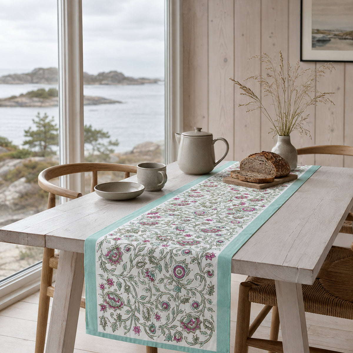 Mint Edge Multicolour Floral Vine Table Runner, styled on a dining table.