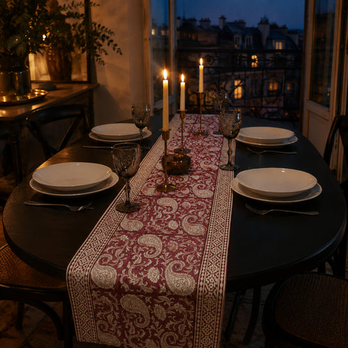 Bordeaux Paisley Vine Table Runner, styled on a dining table.
