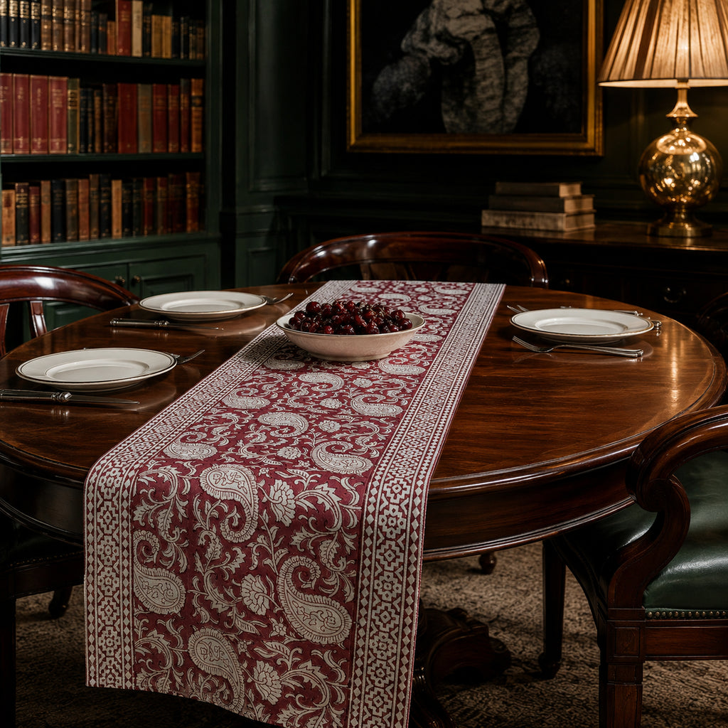 Bordeaux Paisley Vine Table Runner, styled on a dining table.