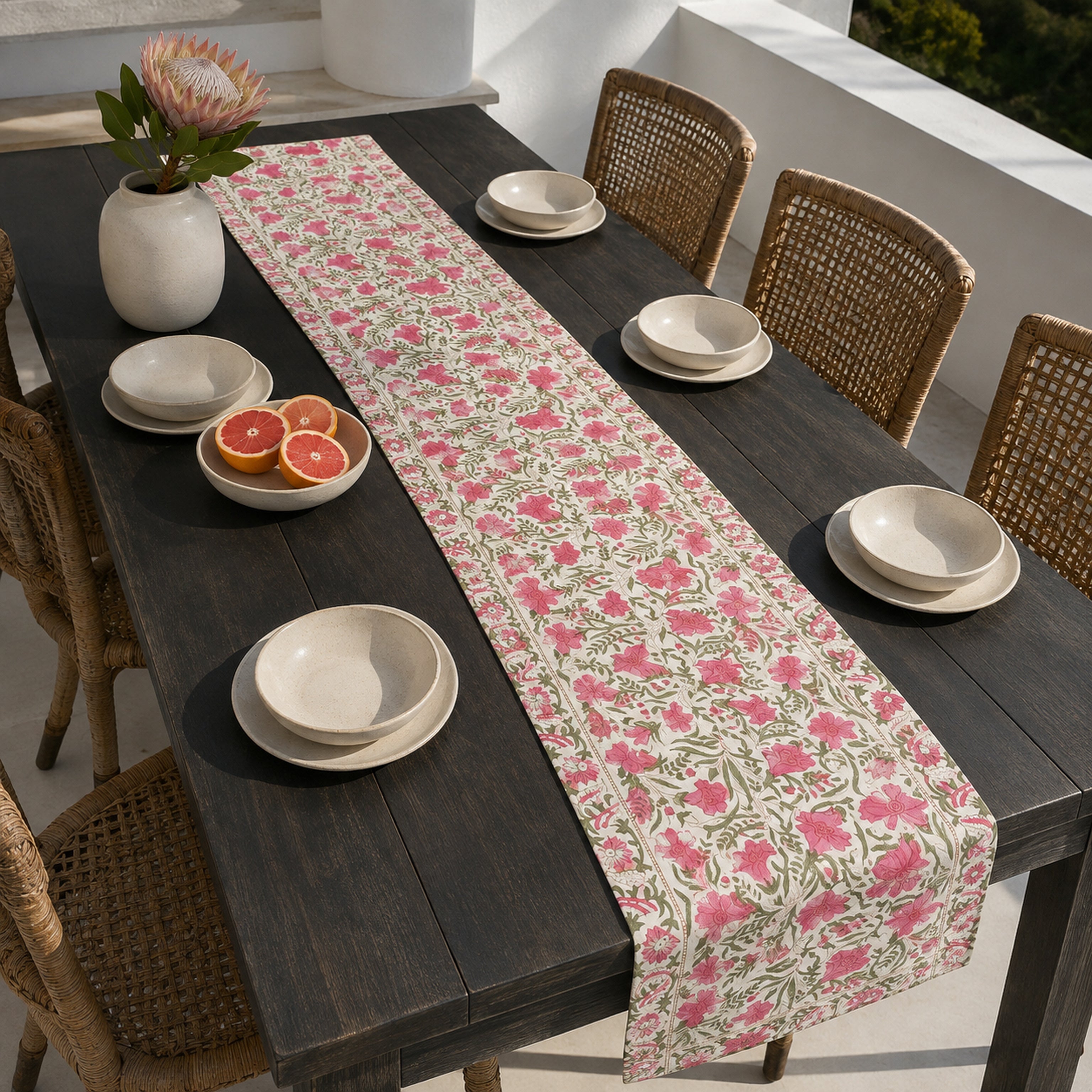 Pink Tulip Garden Table Runner, styled on a dining table.