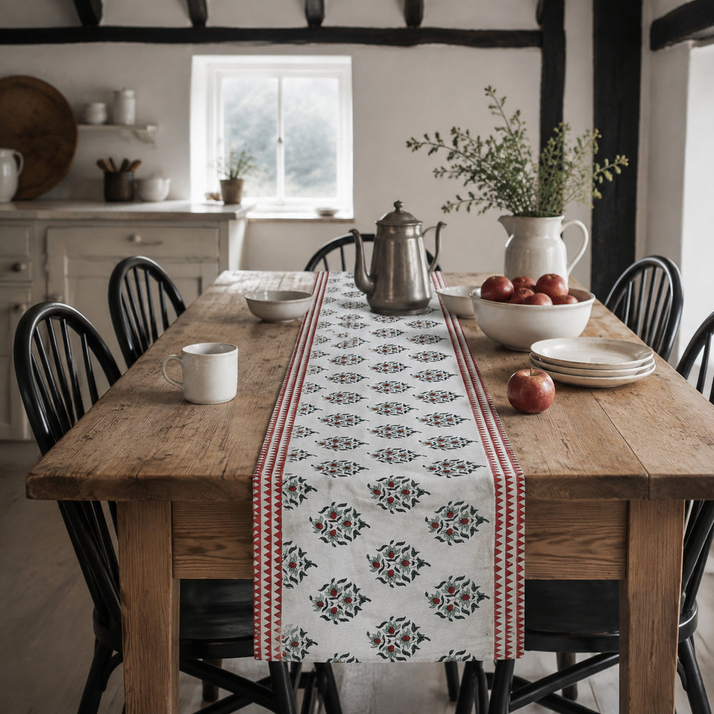 Red Border Mini Floral Table Runner, styled on a dining table.