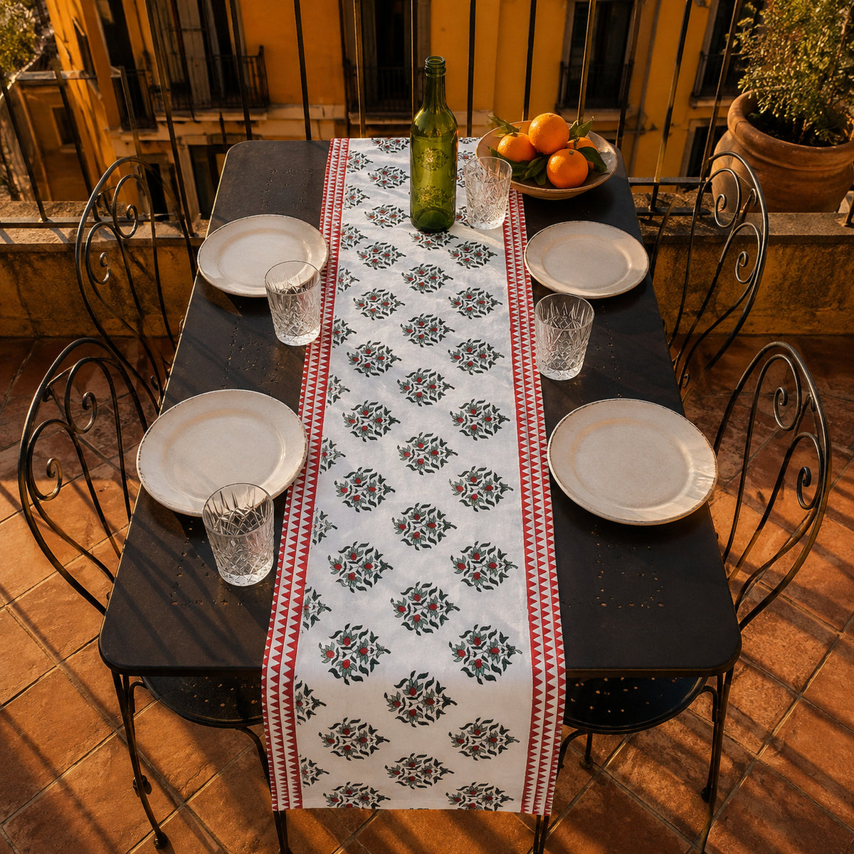 Red Border Mini Floral Table Runner, styled on a dining table.