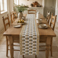 Ochre Border Marigold Table Runner, styled on a dining table.
