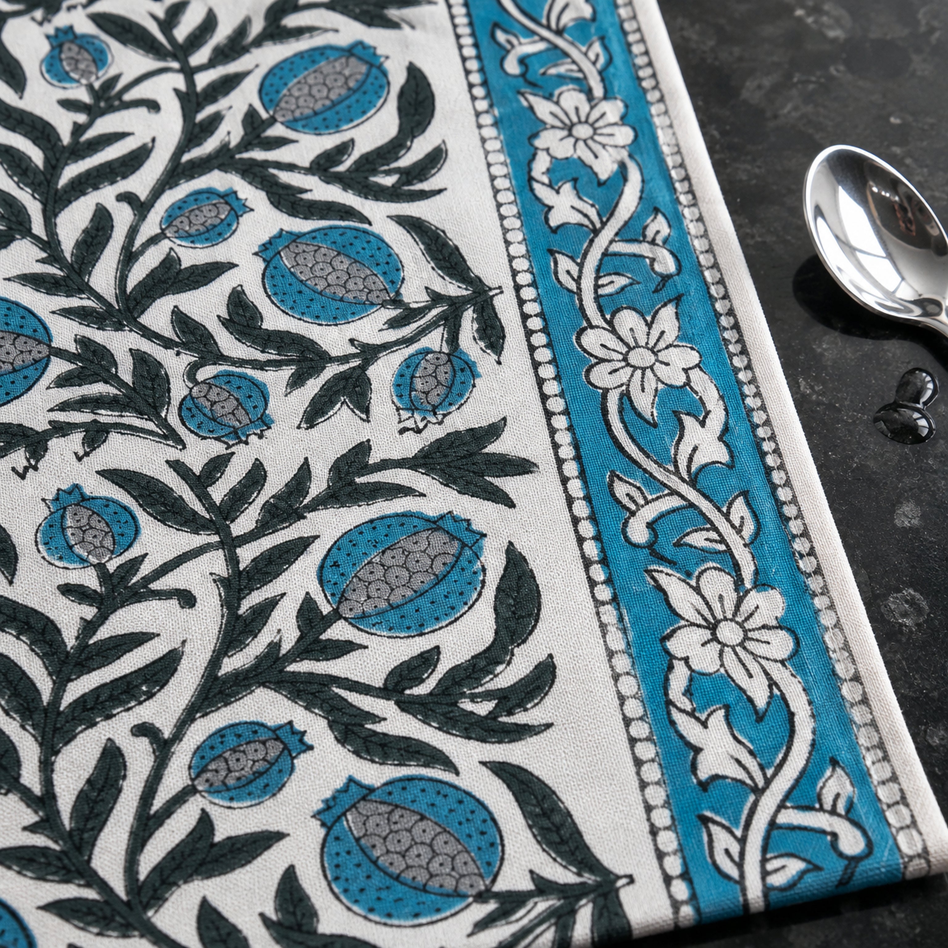 Teal Black Botanical Table Runner, close-up of the print and edge details.
