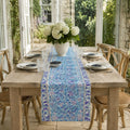 Periwinkle Wildflower Table Runner, styled on a dining table.