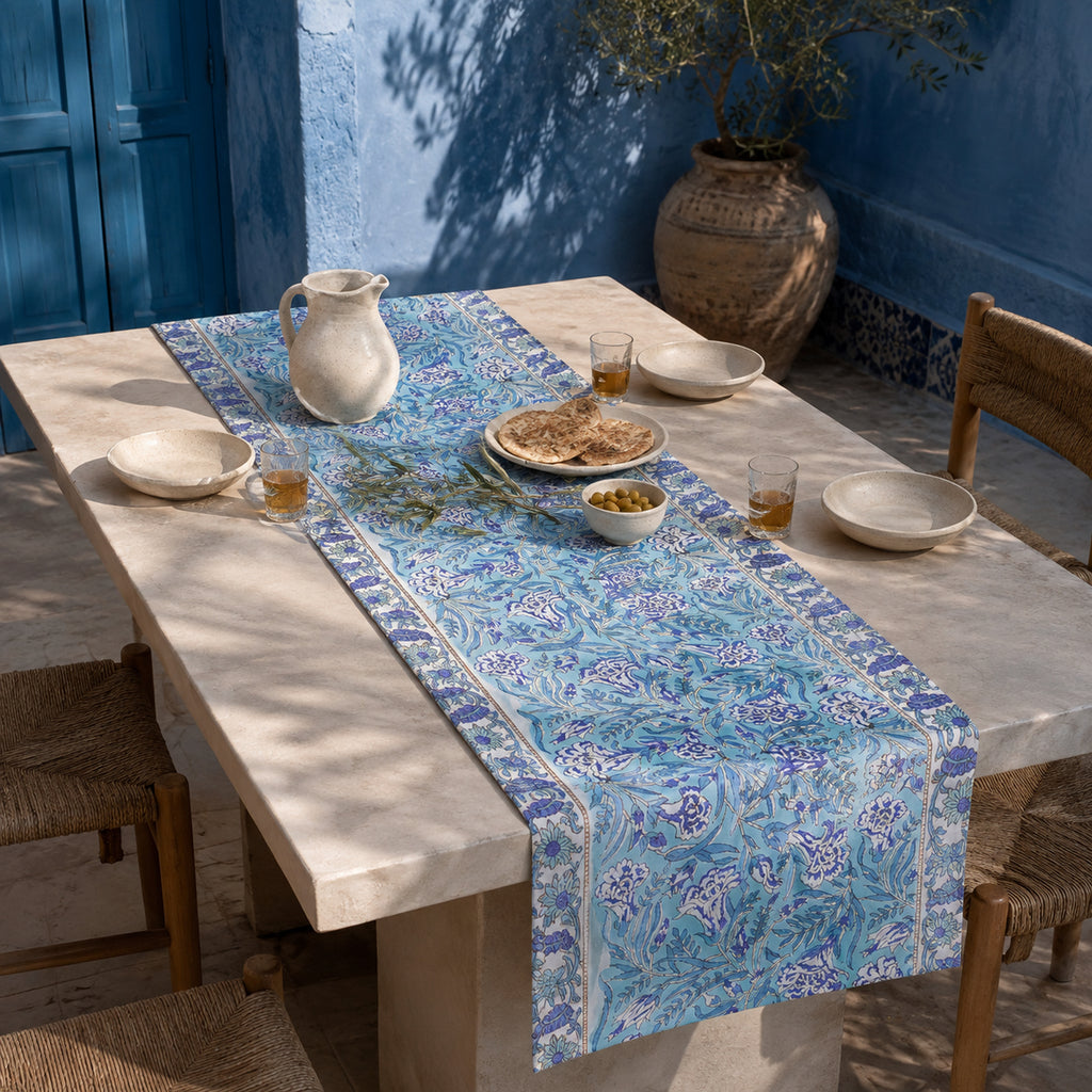 Periwinkle Wildflower Table Runner, styled on a dining table.