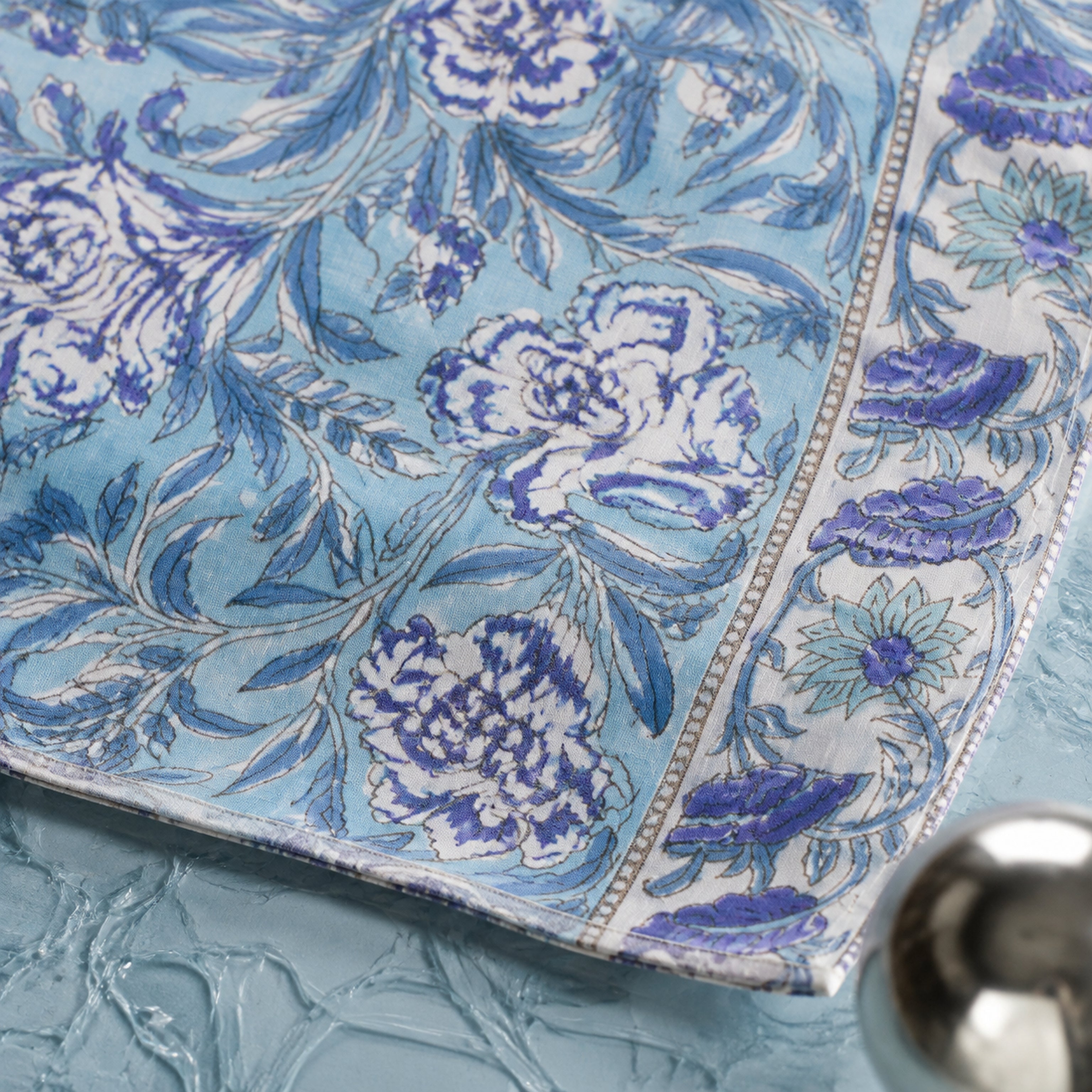 Periwinkle Wildflower Table Runner, close-up of the print and edge details.