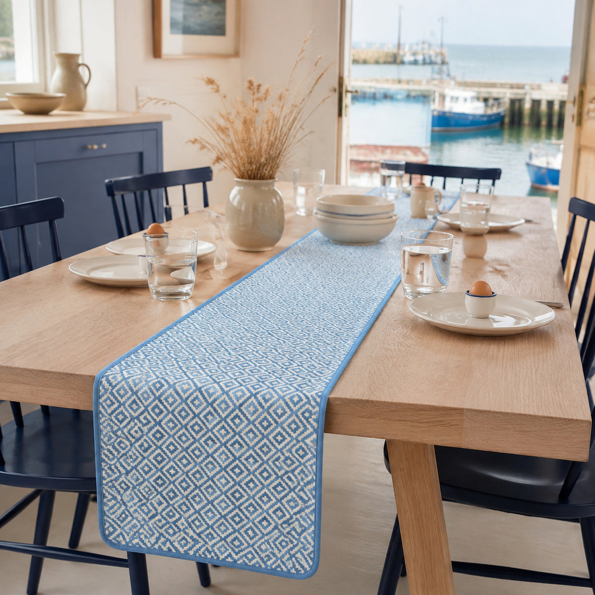 Sky Blue Diamond Geometric Table Runner, styled on a dining table.