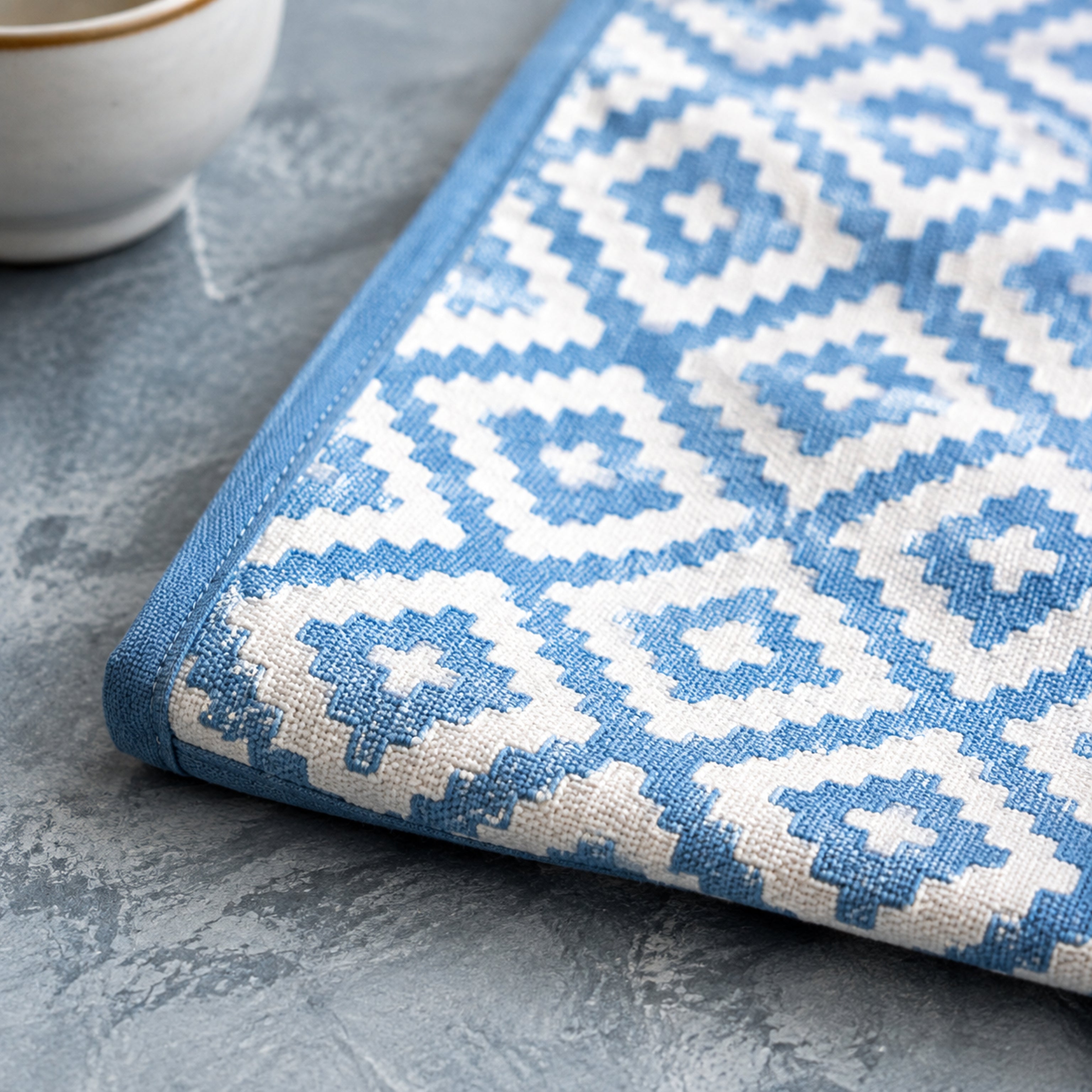 Sky Blue Diamond Geometric Table Runner, close-up of the print and edge details.