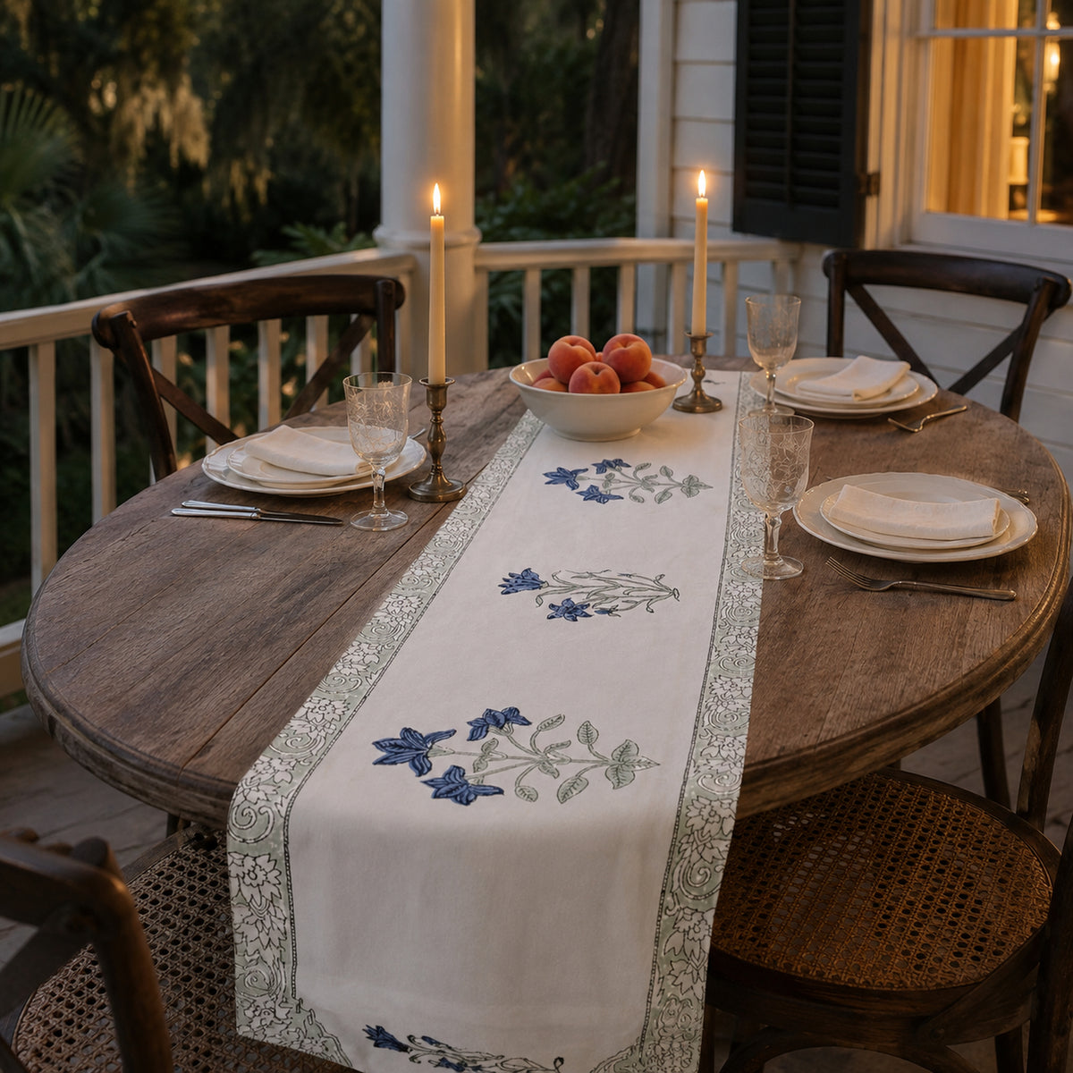 Blue Lily Sage Border Table Runner, styled on a dining table.
