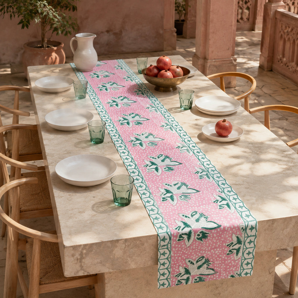 Pink Lily Teal Border Table Runner, styled on a dining table.