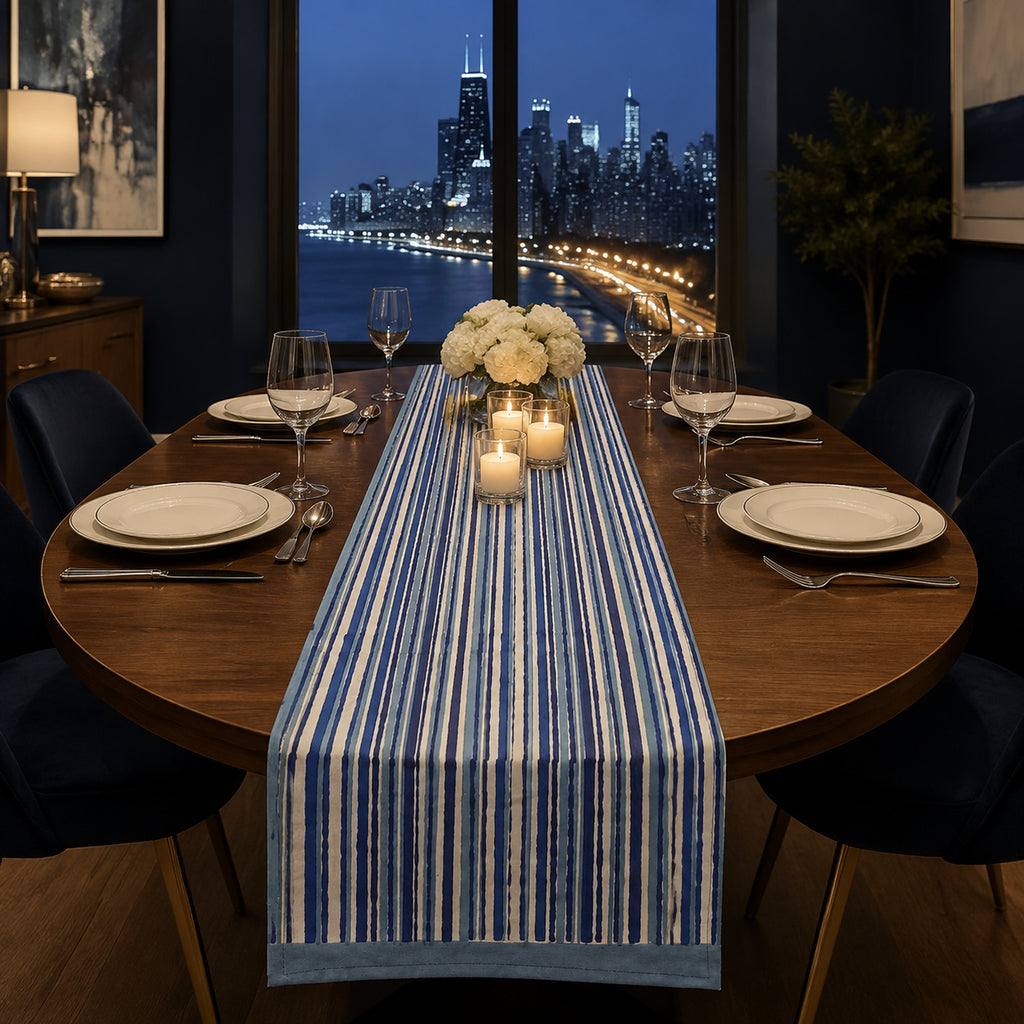 Indigo Stripe Table Runner, styled on a dining table.