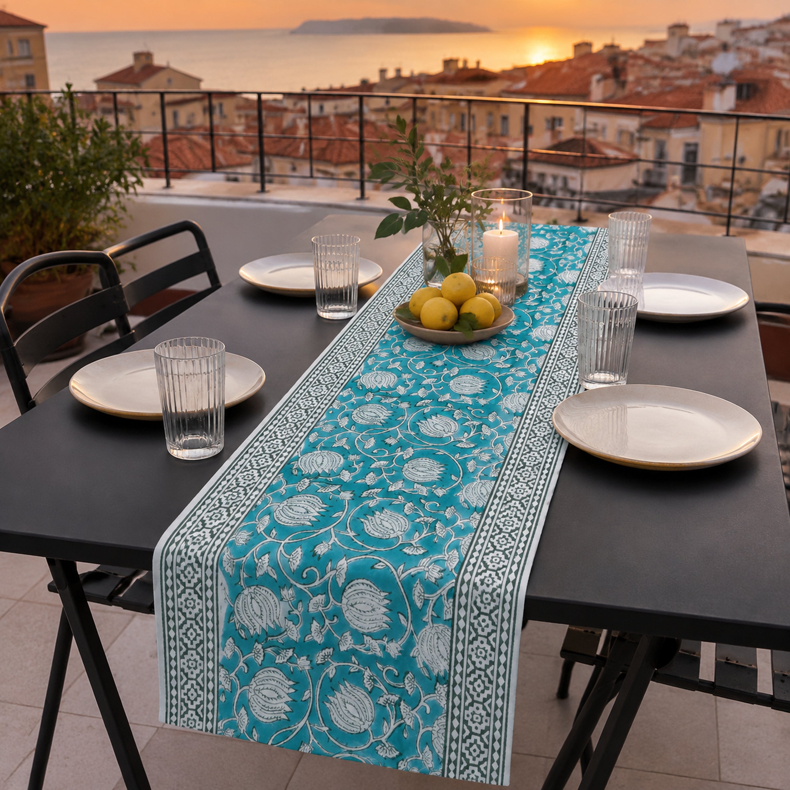 Teal Lotus Vine Table Runner, styled on a dining table.