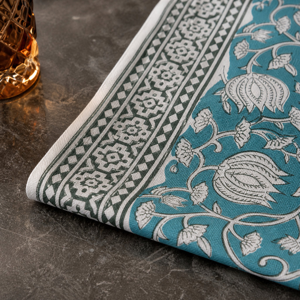 Teal Lotus Vine Table Runner, close-up of the print and edge details.