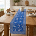 Royal Blue Lotus Vine Table Runner, styled on a dining table.