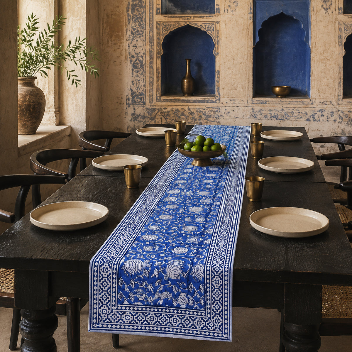 Royal Blue Lotus Vine Table Runner, styled on a dining table.