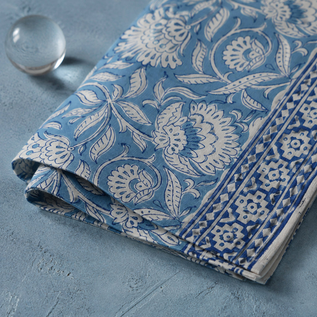 Dusty Blue Floral Vine Table Runner, close-up of the print and edge details.