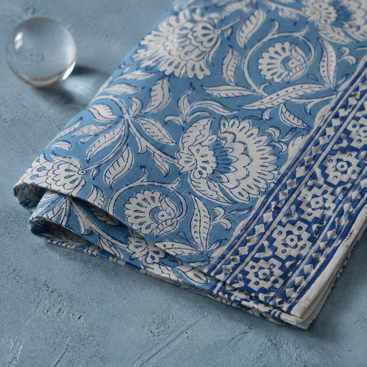 Dusty Blue Floral Vine Table Runner, close-up of the print and edge details.