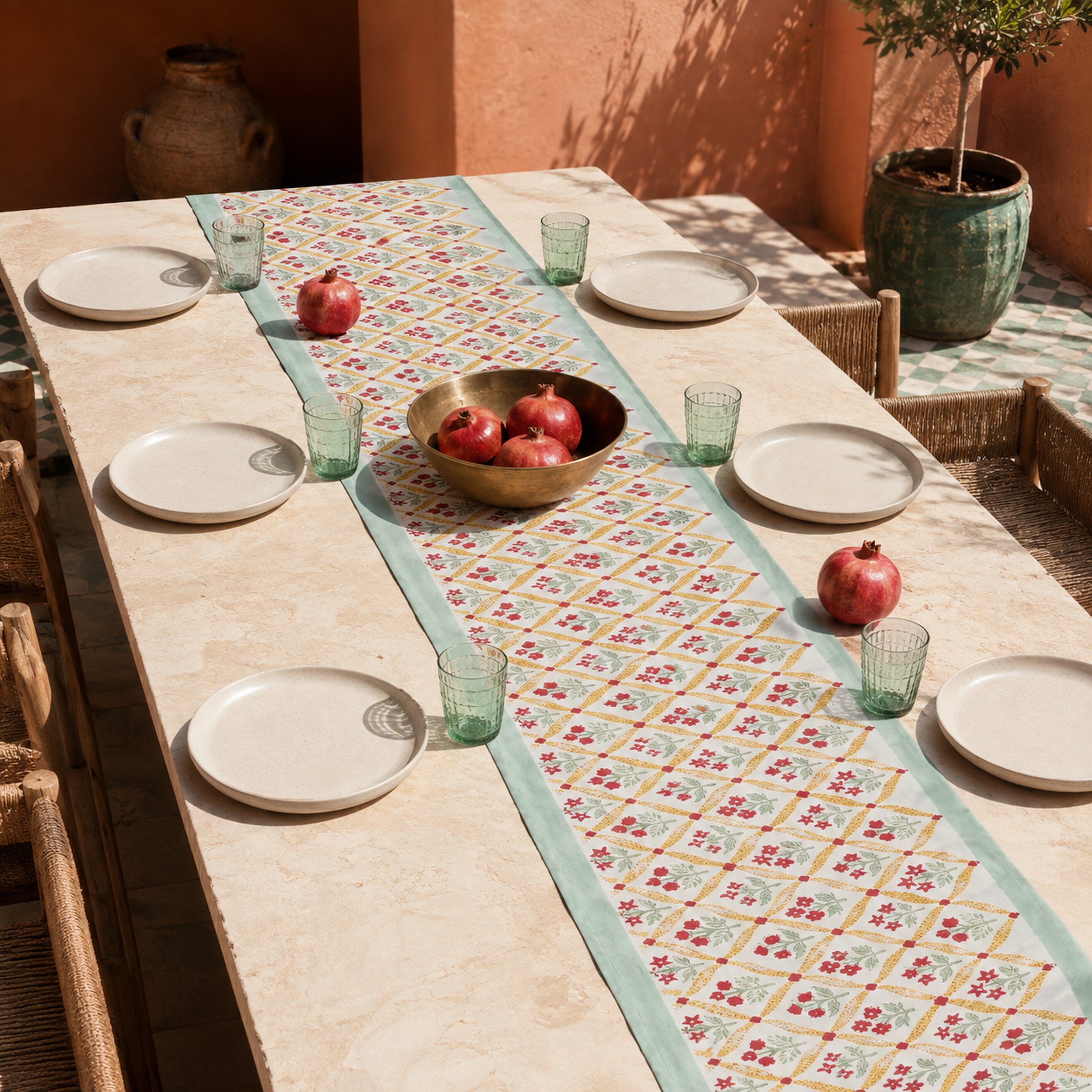 Mint Yellow Red Diamond Floral Table Runner, styled on a dining table.