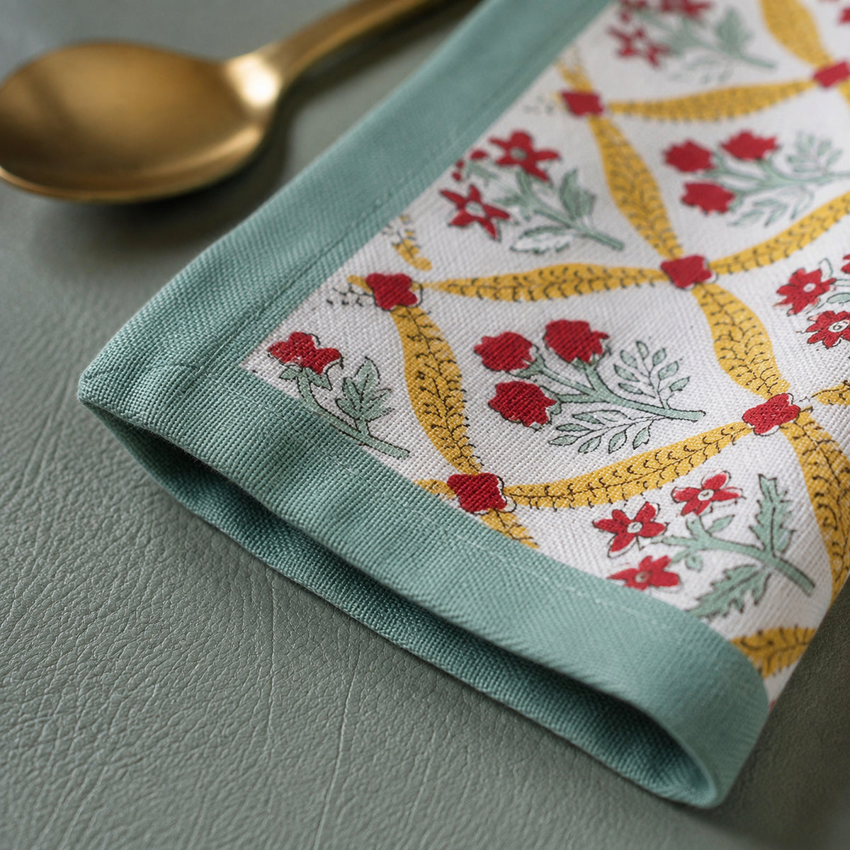 Mint Yellow Red Diamond Floral Table Runner, close-up of the print and edge details.