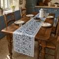 Indigo Dense Floral Vine Table Runner, styled on a dining table.