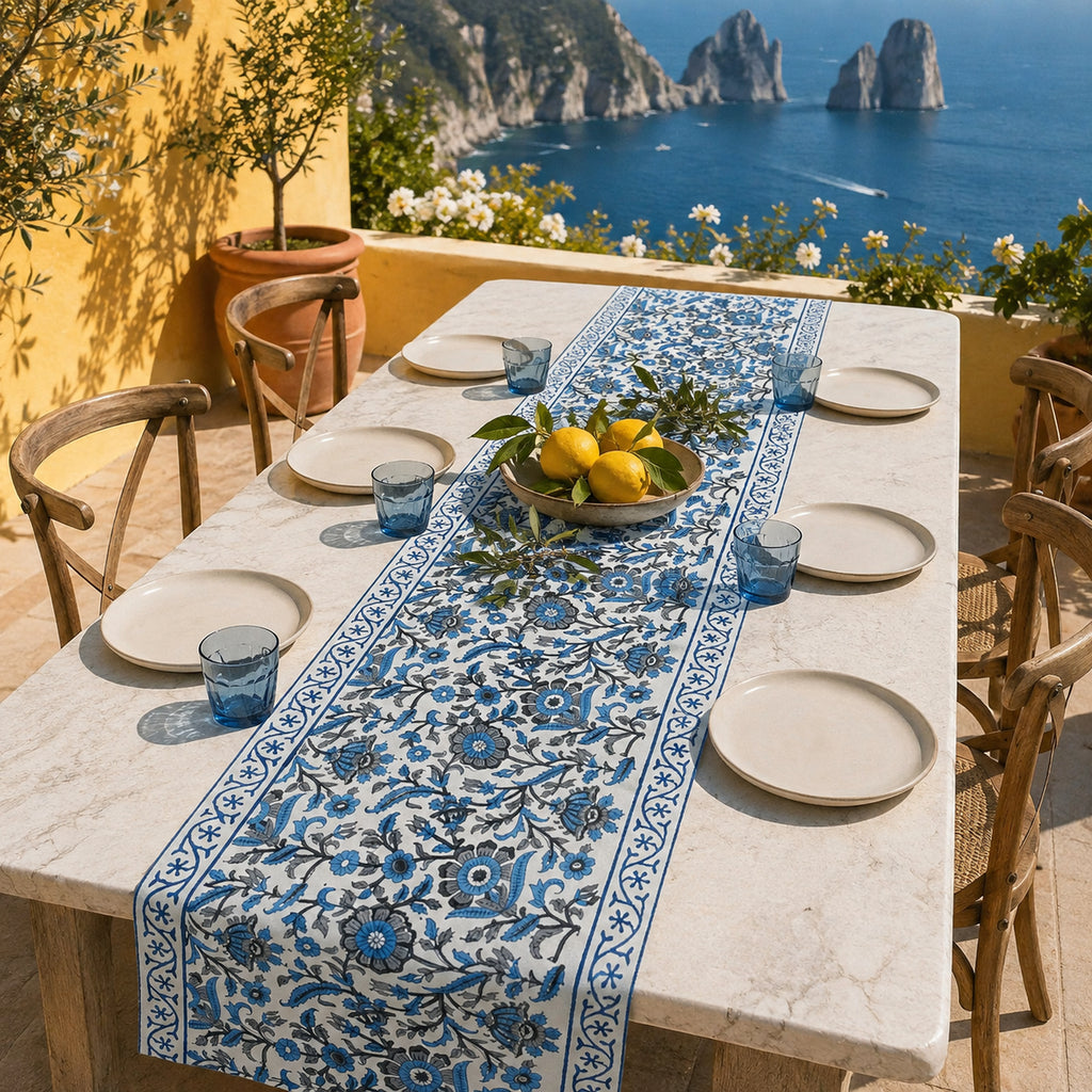 Indigo Dense Floral Vine Table Runner, styled on a dining table.