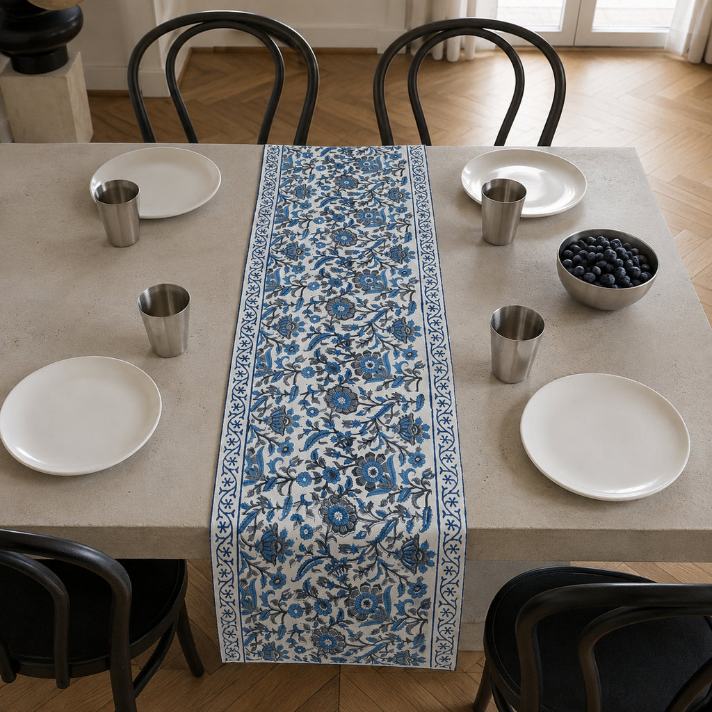 Indigo Dense Floral Vine Table Runner, styled on a dining table.