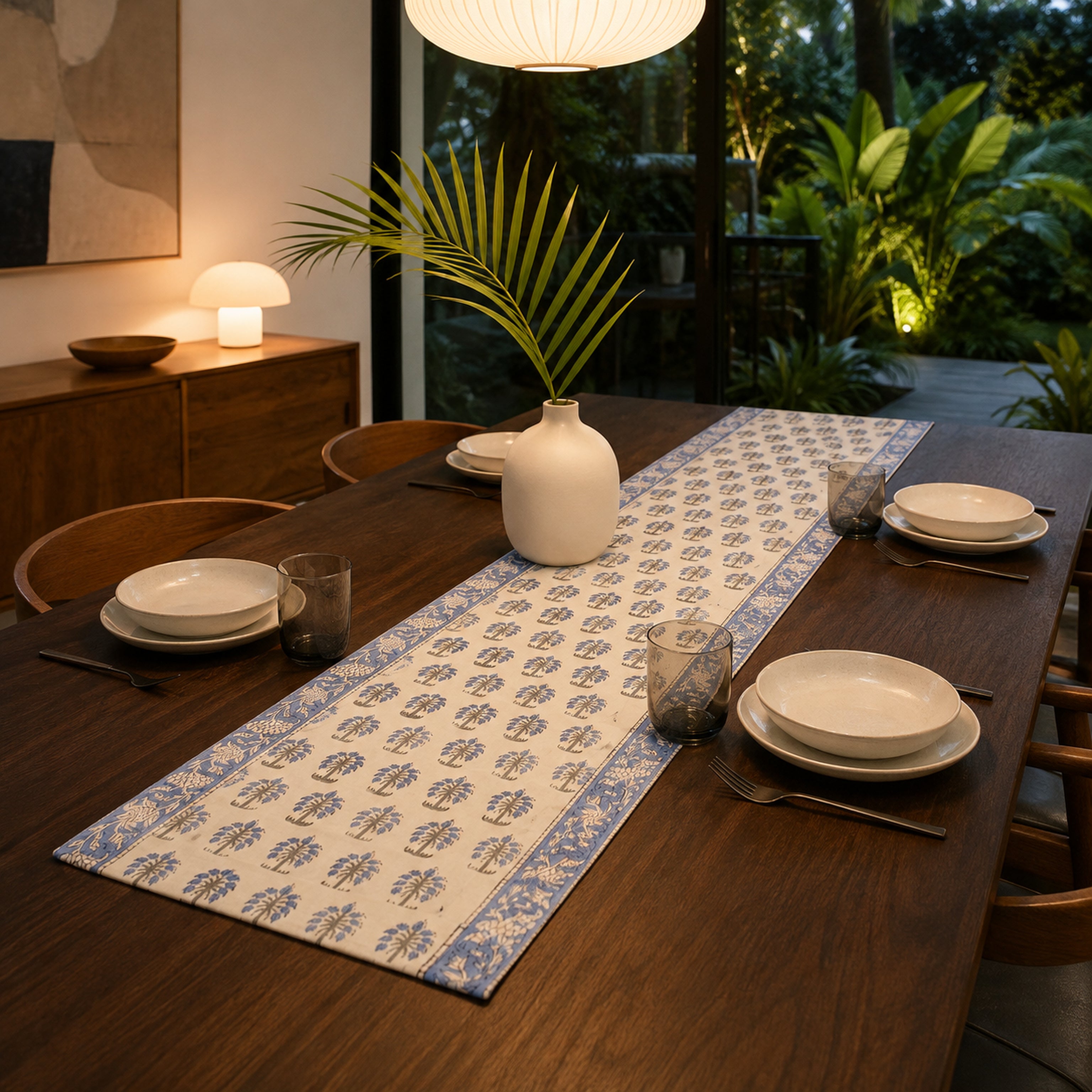 Sky Blue Palm Motif Table Runner, styled on a dining table.